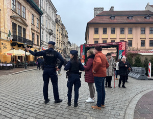 funkconariusze pokazują drogę